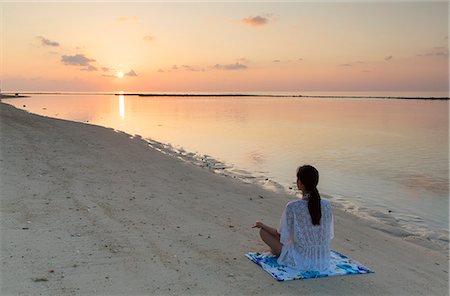 Woman practising yoga at sunrise, Rasdhoo Island, Northern Ari Atoll, Maldives, Indian Ocean, Asia Stock Photo - Rights-Managed, Code: 841-08645470
