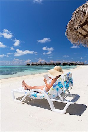 sitting beach - Woman on beach at Olhuveli Beach and Spa Resort, South Male Atoll, Kaafu Atoll, Maldives, Indian Ocean, Asia Stock Photo - Rights-Managed, Code: 841-08645488