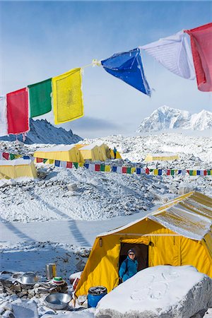 prayer flag - Prayer flags and the Everest base camp at the end of the Khumbu glacier that lies at 5350m, Himalayas, Nepal, Asia Stock Photo - Rights-Managed, Code: 841-08663587