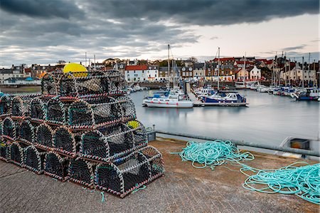 fife - Sailing boats and crab pots at dusk in the harbour at Anstruther, Fife, East Neuk, Scotland, United Kingdom, Europe Foto de stock - Con derechos protegidos, Código: 841-08718014