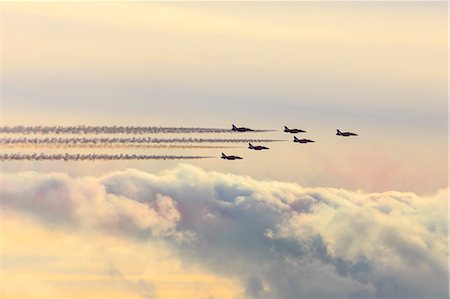 simsearch:700-02216601,k - Red Arrows, Royal Air Force aerobatic display team, with colourful sky, England, United Kingdom, Europe Stock Photo - Rights-Managed, Code: 841-08781723