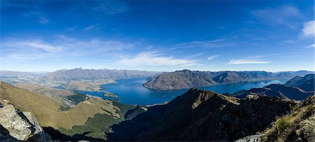 simsearch:841-09194501,k - Steep sharp mountains, a deep blue lake, and mountain town in Queenstown, Otago, South Island, New Zealand, Pacific Stock Photo - Rights-Managed, Code: 841-08781814