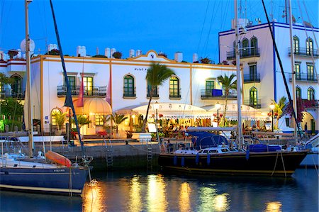 Restaurants in Puerto de Morgan at dusk, Gran Canaria, Canary Islands, Spain, Atlantic Ocean, Europe Stock Photo - Rights-Managed, Code: 841-08797729