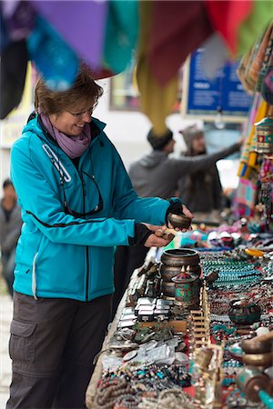 Shopping for souvenirs in Namche Bazaar, the main town during the Everest base camp trek, Khumbu Region, Nepal, Asia Stock Photo - Rights-Managed, Code: 841-08797813