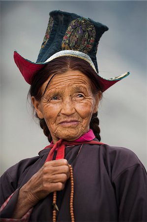 Buddhist woman travelling to a festival at the 14th-century Diskit Monastery, Ladakh, India, Asia Stock Photo - Rights-Managed, Code: 841-08797889