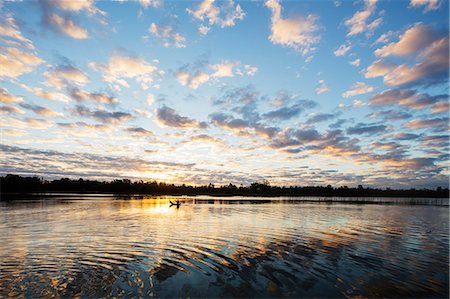 Clouds at sunset, Pangalanes Lakes canal system, Tamatave, Madagascar, Africa Stock Photo - Rights-Managed, Code: 841-08821719