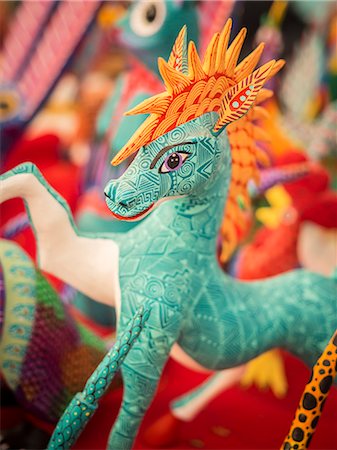 Colorful carved wooden figure (alebrije) of a horse, Oaxaca valley, Oaxaca, Mexico, North America Stock Photo - Rights-Managed, Code: 841-08887341