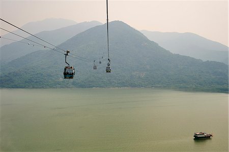 simsearch:841-09256972,k - Ngong Ping 360 gondola takes visitors to Big Buddha and Po Lin Monastery, Lantau Island, Hong Kong, China, Asia Stock Photo - Rights-Managed, Code: 841-09055405