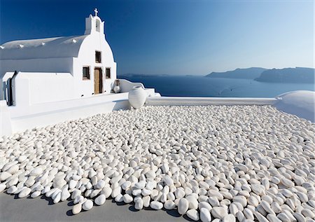 Small whitewashed church against blue sea and sky, Finikia, near Oia, Santorini, Cyclades, Greek Islands, Greece, Europe Stock Photo - Rights-Managed, Code: 841-09059938