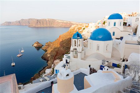 simsearch:841-09059930,k - Classic view of the village of Oia with its blue domed churches and colourful houses, Oia, Santorini, Cyclades, Greek Islands, Greece, Europe Stock Photo - Rights-Managed, Code: 841-09059931