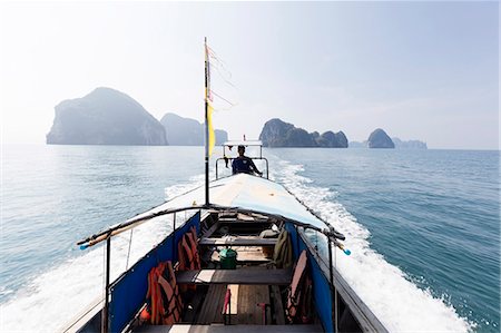 simsearch:841-07673544,k - Traditional longtail boat with the Koh Hong Islands in the background, Krabi Coast, Krabi, Thailand, Southeast Asia, Asia Stock Photo - Rights-Managed, Code: 841-09076971