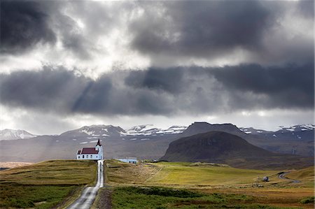 rif - Ingjaldsholskirkja set against mountains on a dramatic stormy day, near Rif, Snaefellsnes Peninsula, Iceland, Polar Regions Stockbilder - Lizenzpflichtiges, Bildnummer: 841-09077030