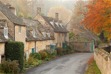 photo of autumn in england - Line of Cotswold stone cottages in autumn mist, Snowshill, Cotswolds, Gloucestershire, England, United Kingdom, Europe Stock Photo - Rights-Managed, Code: 841-09077310
