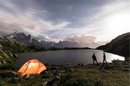 Hikers and tent on the shore of Lacs De Cheserys at night with Mont Blanc massif in the background, Chamonix, Haute Savoie, French Alps, France, Europe Photographie de stock - Rights-Managed, Code: 841-09085899