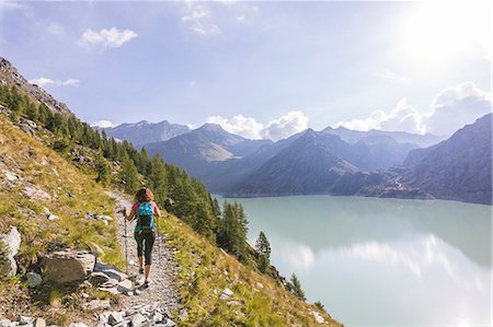 simsearch:841-09256170,k - Hiker on path towards Rifugio Bignami beside the dam and water basin of Alpe Gera, Malenco Valley, Valtellina, Lombardy, Italy, Europe Stock Photo - Rights-Managed, Code: 841-09085904