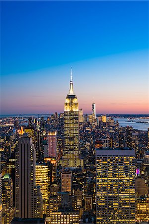 Manhattan skyline and Empire State Building at dusk, New York City, United States of America, North America Stock Photo - Rights-Managed, Code: 841-09086029