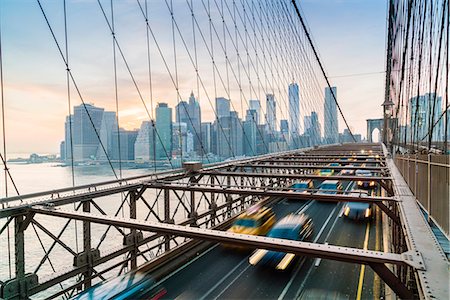 east river - Rush hour traffic on Brooklyn Bridge and Manhattan skyline beyond, New York City, United States of America, North America Stock Photo - Rights-Managed, Code: 841-09086035