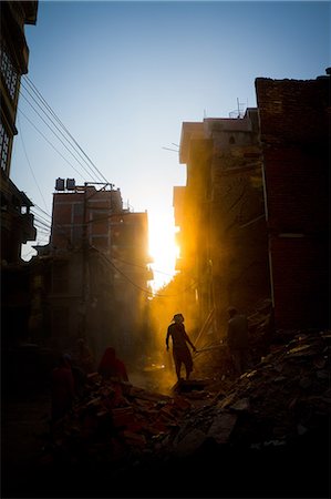 simsearch:841-08279049,k - Rays of early evening sun on the dusty streets of Thamel after earthquake, Kathmandu, Nepal, Asia Foto de stock - Direito Controlado, Número: 841-09086224