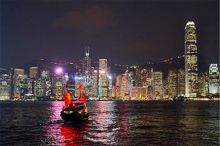 simsearch:841-08568864,k - Traditional junk boat on Victoria Harbour with city skyline behind illuminated at night, Hong Kong, China, Asia Stock Photo - Rights-Managed, Code: 841-09135260