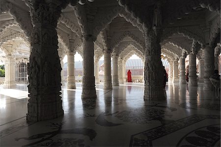 saari - Woman in red sari in the marble pillared hall of Shri Swaminarayan temple, built after the 2001 earthquake, Bhuj, Gujarat, India, Asia Stock Photo - Rights-Managed, Code: 841-09135416