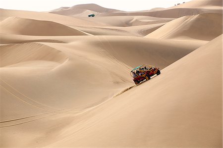 dune driving - Dune buggy in a desert near Huacachina, Ica region, Peru, South America Foto de stock - Con derechos protegidos, Código: 841-09147495