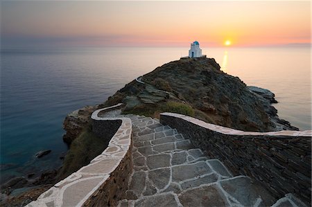 Steps leading down to Greek Orthodox chapel of Eftamartyres at dawn, Kastro, Sifnos, Cyclades, Aegean Sea, Greek Islands, Greece, Europe Stock Photo - Rights-Managed, Code: 841-09155266