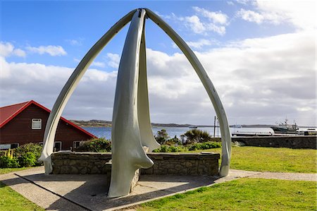simsearch:841-08860748,k - Restored Whalebone Arch, ships and the Narrows waterfront, Stanley Harbour, Port Stanley, Falkland Islands, South America Stock Photo - Rights-Managed, Code: 841-09162995