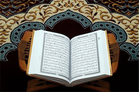 An open Holy Quran on wood stand, Hanoi, Vietnam, Indochina, Southeast Asia, Asia Stock Photo - Rights-Managed, Code: 841-09163383