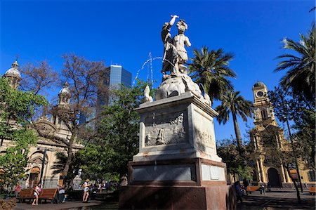 simsearch:841-06500988,k - Simon Bolivar liberator fountain, lush trees, blue sky, Plaza de Armas, Santiago Centro, Santiago de Chile, Chile, South America Stock Photo - Rights-Managed, Code: 841-09174528