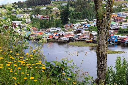 Palafitos, colourful stilt houses on water's edge, elevated view, unique to Chiloe, Castro, Isla Grande de Chiloe, Chile, South America Stock Photo - Rights-Managed, Code: 841-09174534