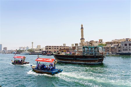 simsearch:841-07355218,k - Abras, traditional water taxis crossing Dubai Creek between Deira and Bur Dubai, Dubai, United Arab Emirates, Middle East Stock Photo - Rights-Managed, Code: 841-09174628