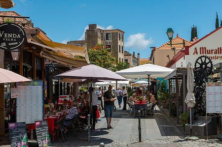 simsearch:841-05846758,k - View of cafes and restaurants on old town street, Funchal, Madeira, Portugal, Atlantic, Europe Stock Photo - Rights-Managed, Code: 841-09183804