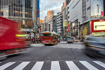 Traffic captured with blurred motion through the Shibuya Crossing, Tokyo, Japan, Asia Stock Photo - Rights-Managed, Code: 841-09205494