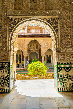 Patio de las Doncellas from interior of room with arabic mosaic walls and archways, Real Alcazar, UNESCO World Heritage Site, Seville, Andalusia, Spain, Europe Stock Photo - Rights-Managed, Code: 841-09229521