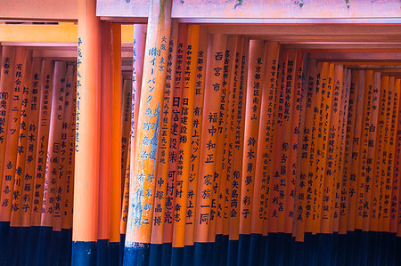 simsearch:841-06448336,k - Vermilion torii gates, donated and inscribed by businesses and individuals, Fushimi Inari Shrine, Kyoto, Japan, Asia Stock Photo - Rights-Managed, Code: 841-09241932