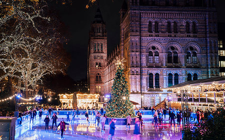 Christmas tree and ice skating rink at night outside the Natural History Museum, Kensington, London, England, United Kingdom, Europe Stock Photo - Rights-Managed, Code: 841-09255847