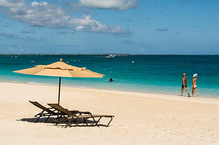 simsearch:841-07590518,k - Beach umbrellas on Grace Bay Beach, Providenciales, Turks and Caicos Islands, West Indies, Central America Stock Photo - Rights-Managed, Code: 841-09257038