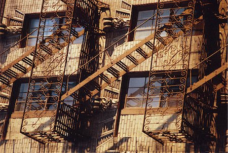 simsearch:841-02710643,k - Detail of building with fire escape, Manhattan, New York City, United States of America Foto de stock - Con derechos protegidos, Código: 841-02704400