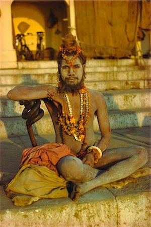 Hindu holy man, Ghatia meditating as the sun rises in the early morning, Varanasi (Benares), Uttar Pradesh State, India Stock Photo - Rights-Managed, Code: 841-02704631