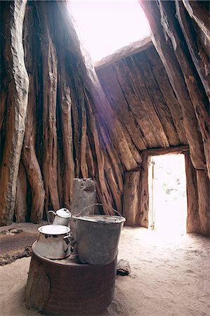 Smoke hole and doorway in Navaho (Navajo) dwelling of mud covered pinyon pine logs, Arizona, United States of America (U.S.A.), North America Stock Photo - Rights-Managed, Code: 841-02704866