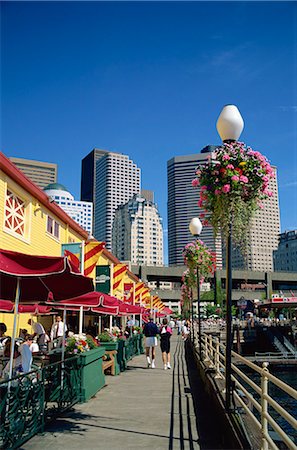 Cafes on Pier 56 on the waterfront with tower blocks of the city in the background, in Seattle, Washington State, United States of America, North America Stock Photo - Rights-Managed, Code: 841-02704929