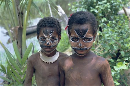 Portrait of two children with facial decoration, Sepik River, Papua New Guinea, Pacific Foto de stock - Direito Controlado, Número: 841-02705067