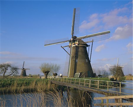 Canal and windmills, Kinderdijk, UNESCO World Heritage Site, Holland (The Netherlands), Europe Stock Photo - Rights-Managed, Code: 841-02705613