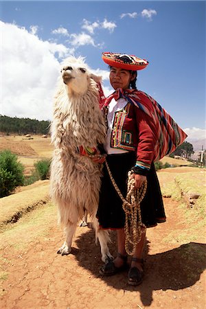 peru children - Portrait of a Peruvian girl in traditional dress, with an animal, near Cuzco, Peru, South America Stock Photo - Rights-Managed, Code: 841-02705658