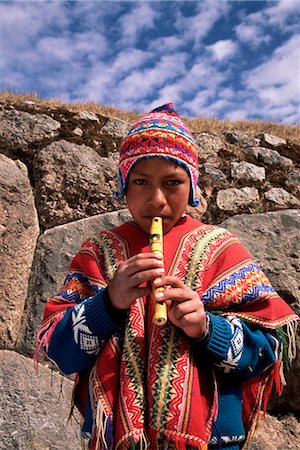 peru traditional hats - Peruvian boy playing the flute, Peru, South America Foto de stock - Con derechos protegidos, Código: 841-02705663