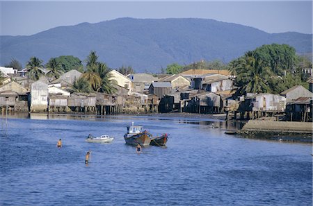 simsearch:841-02916485,k - Fishermen's houses, boats and weed gatherers, Nha Trang, Vietnam, Indochina, Southeast Asia, Asia Stock Photo - Rights-Managed, Code: 841-02706792