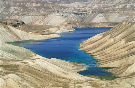 One of the crater lakes at Band-E-Amir (Dam of the King), Afghanistan's first National Park set up in 1973 to protect the five lakes, believed by locals to have been created by the Prophet Mohammed's son-in-law Ali, making them a place of pilgrimage, Afghanistan, Asia Stock Photo - Rights-Managed, Code: 841-02707327