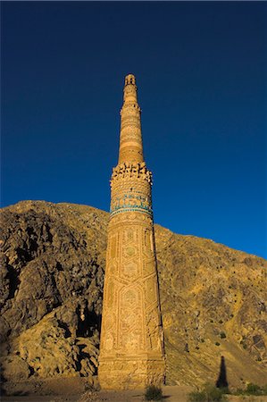 Minarett von Jam, UNESCO-Weltkulturerbe, datierend aus dem 12. Jahrhundert, mit Quasr Zarafshan im Hintergrund, Provinz Ghor, Afghanistan, Asien Stockbilder - Lizenzpflichtiges, Bildnummer: 841-02707355