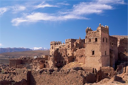 Ruins of Glaoui kasbah at Telouet, with the High Atlas mountains in the distance, Telouet, near Ouarzazate, Morocco, North Africa, Africa Stock Photo - Rights-Managed, Code: 841-02707638