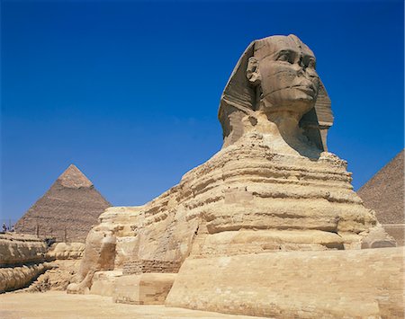 sphinx - Le grand Sphinx et une des pyramides à Gizeh, patrimoine mondial de l'UNESCO, le Caire, Egypte, Afrique du Nord, Afrique Photographie de stock - Rights-Managed, Code: 841-02707769